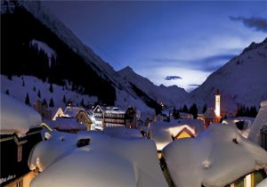 andermatt village at night with snow