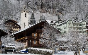 champery wooden houses in winter with snow