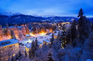 crans montana at night lit up by oliver maire